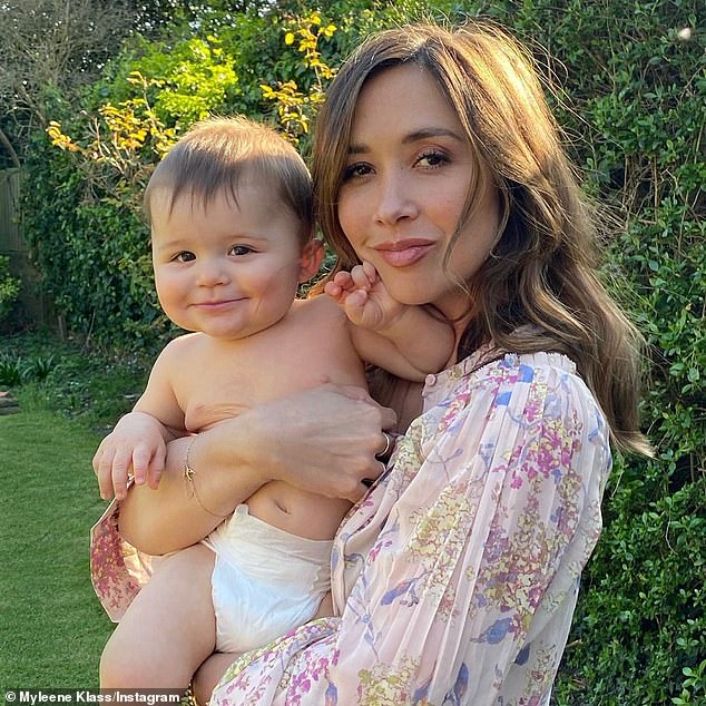 Joyful: The Smooth radio presenter, 42, was every inch the proud mother as she managed to capture moment her little one completed the milestone